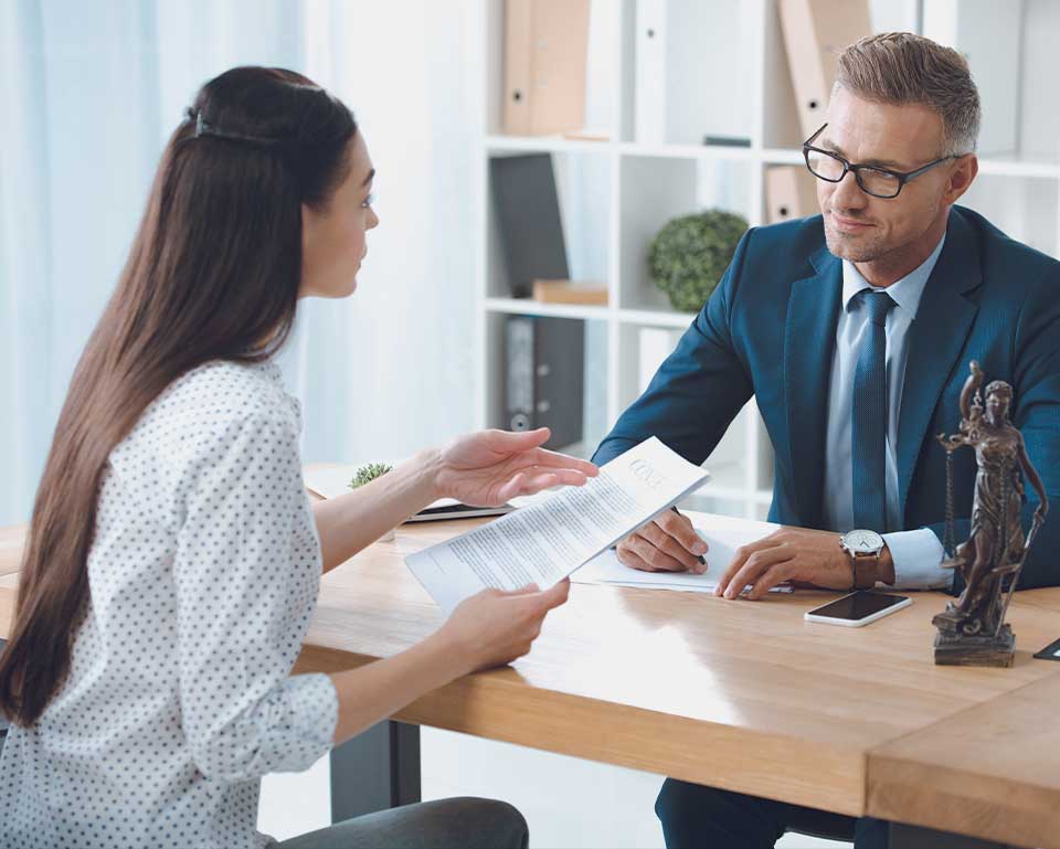 An attorney reviewing an estate plan with a client